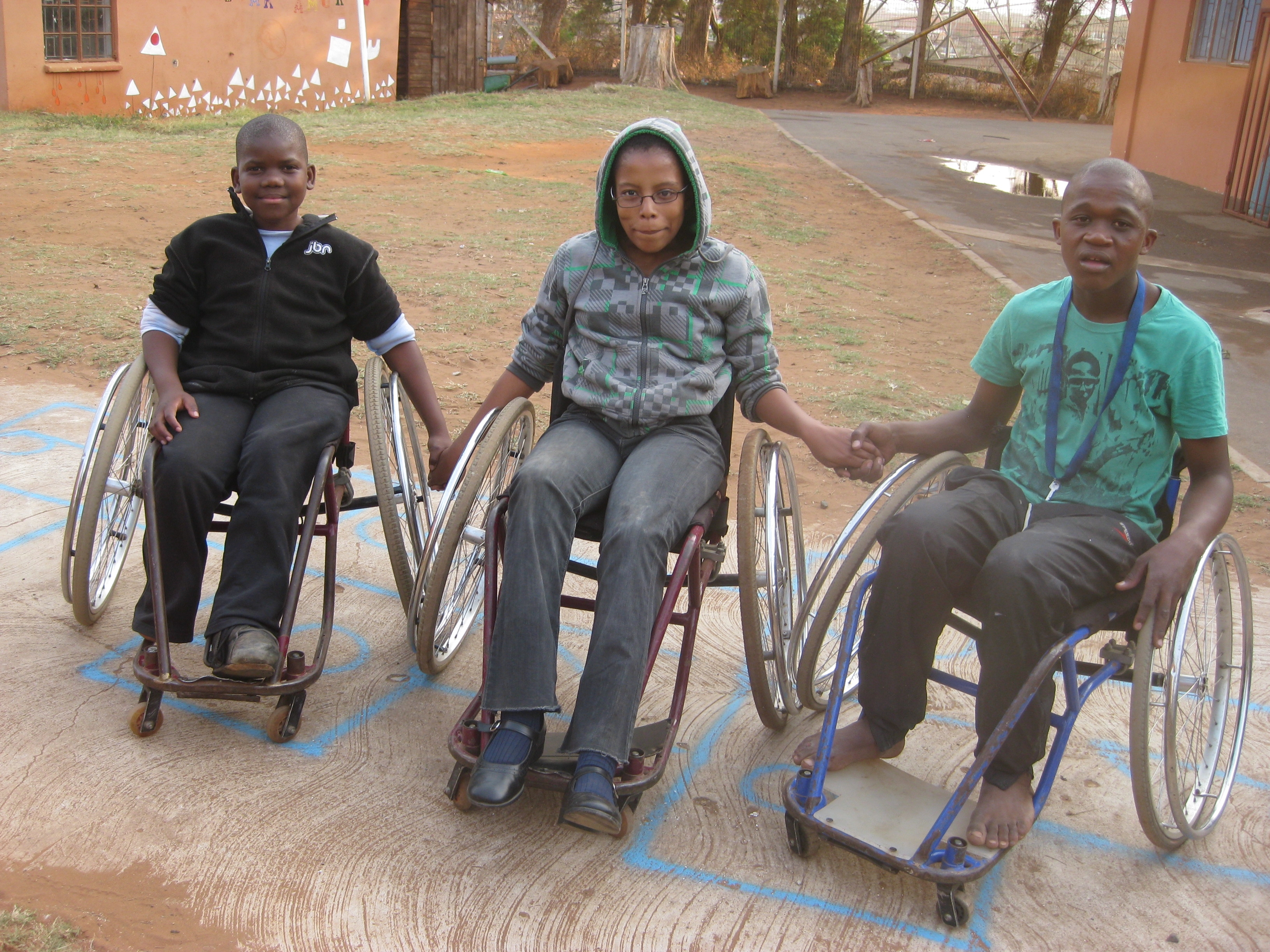 3 kids in wheelchairs